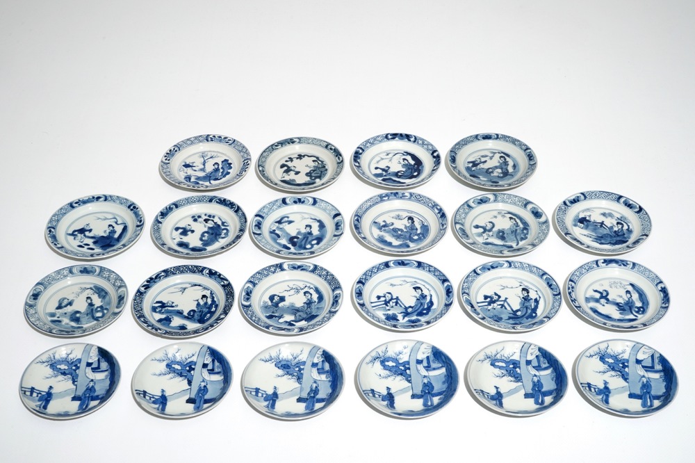 Twenty-two Chinese blue and white saucers, mostly Kangxi