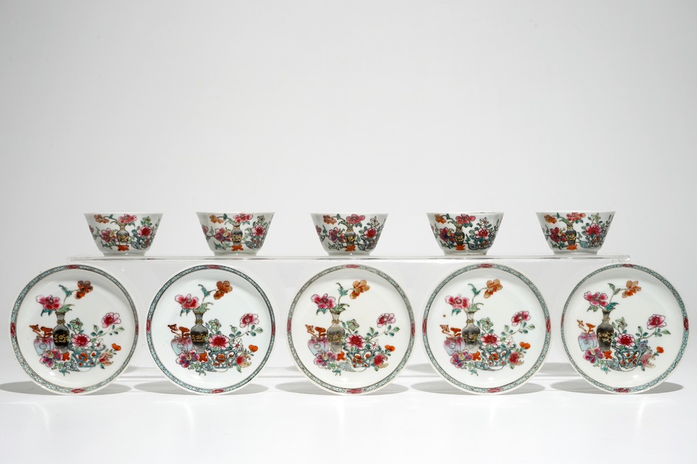 Five Chinese famille rose cups and saucers with vases among flowers, Yongzheng/Qianlong