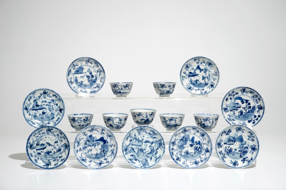 Seven Chinese blue and white cups and nine saucers, Kangxi