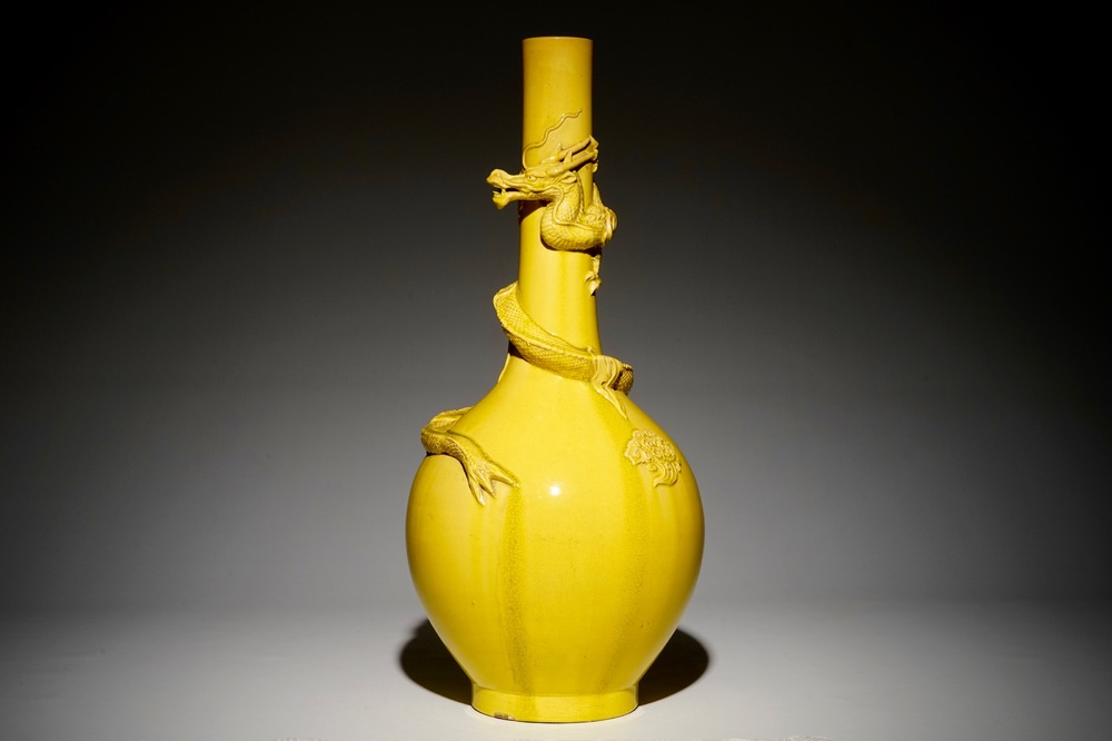 A tall Japanese Awaji monochrome yellow vase with applied dragon, Meiji, ca. 1900