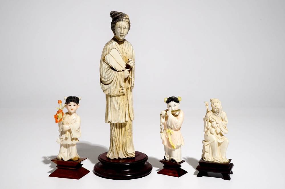 Four Chinese ivory figures on wooden bases, 19/20th C.