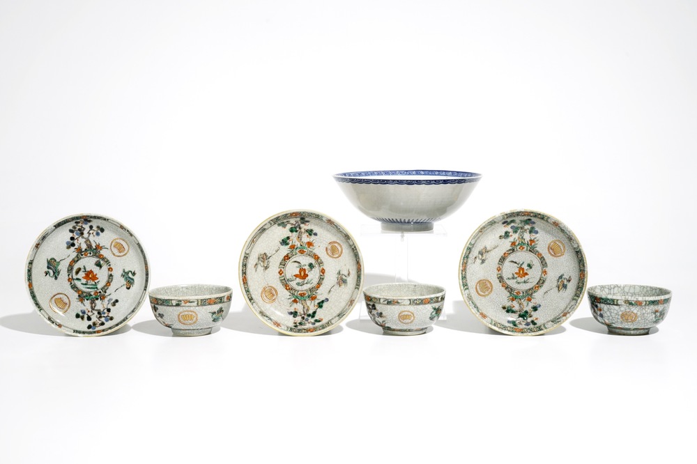 Three Chinese famille verte crackle glaze cups and saucers and a blue and white soft paste bowl, Kangxi