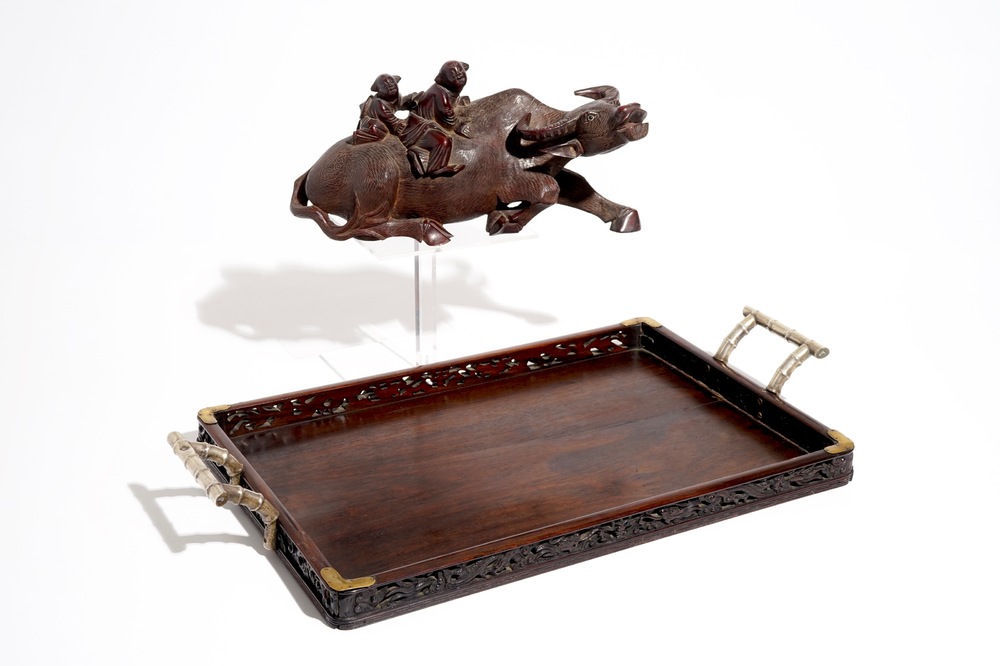 A Chinese wooden model of an ox and a wooden tray with silver handles, 19th C.