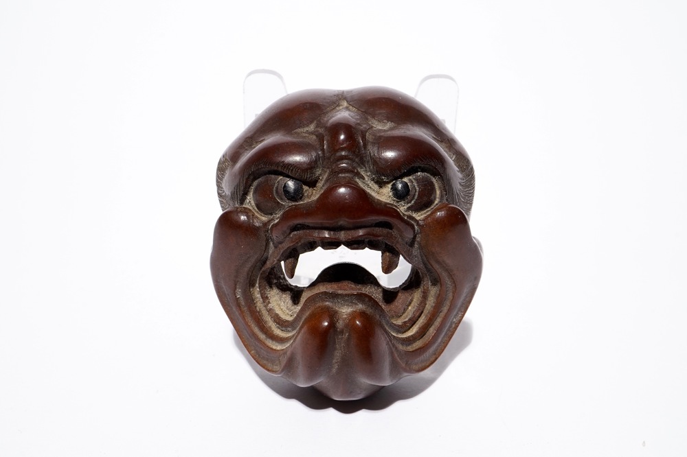 Un netsuke en buis figurant une t&ecirc;te de diable ou d&eacute;mon, Japon, &eacute;poque Edo/Meiji, 18/19&egrave;me