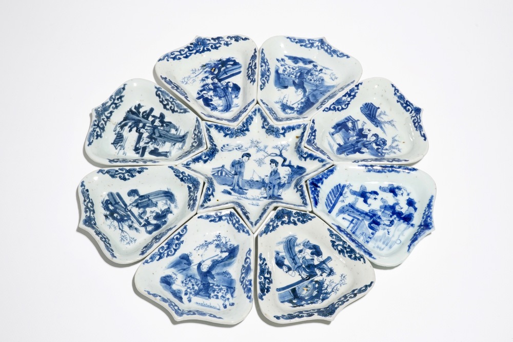 A Chinese blue and white sweetmeat or rice table set with figural design, Kangxi