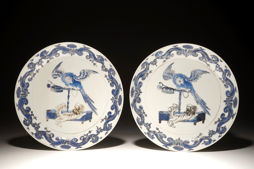 A pair of Chinese Pronk studio eggshell plates with parrots on a perch, Yongzheng/Qianlong