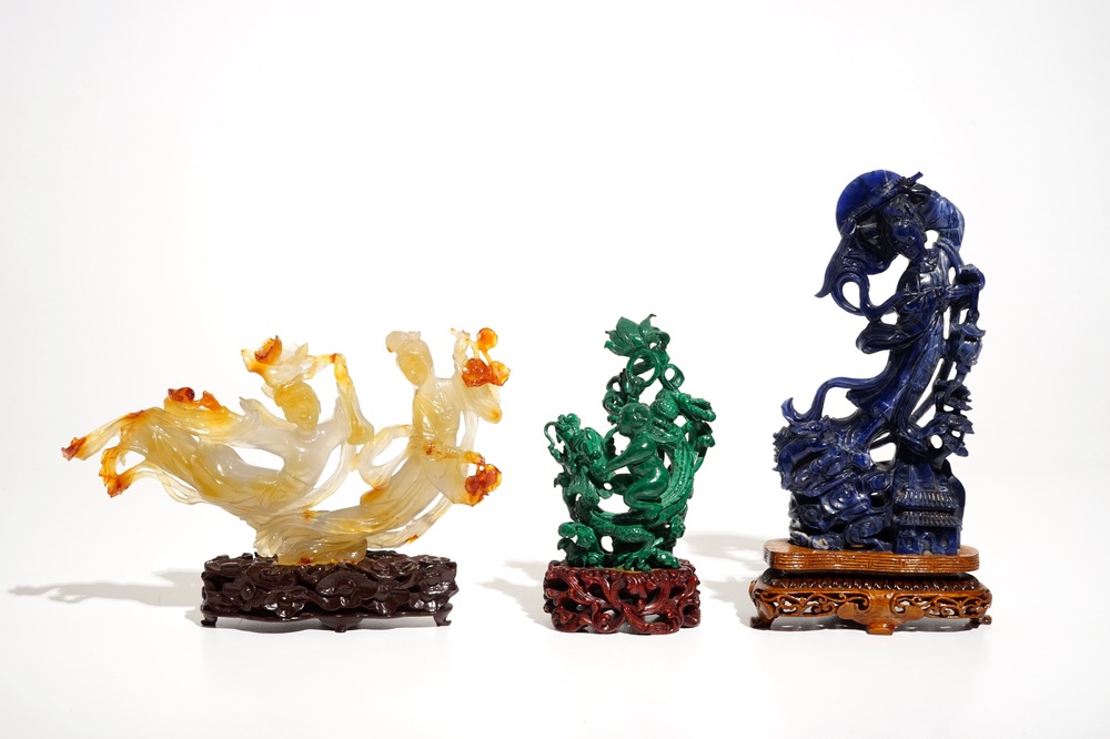 Three Chinese lapis lazuli, agate and malachite figures on stands, 20th C.