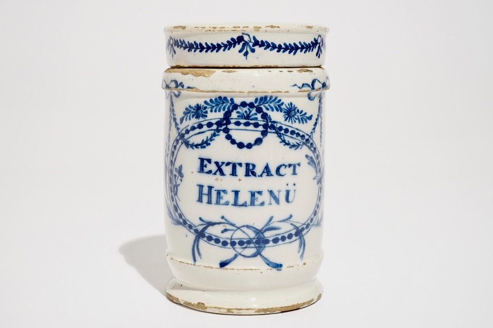 A Dutch Delft blue and white albarello or drug jar with cover, 18th C.