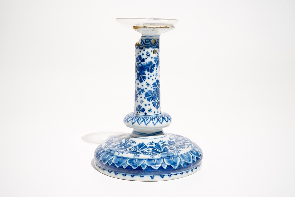 A Dutch Delft blue and white candlestick, 1st half 18th C.