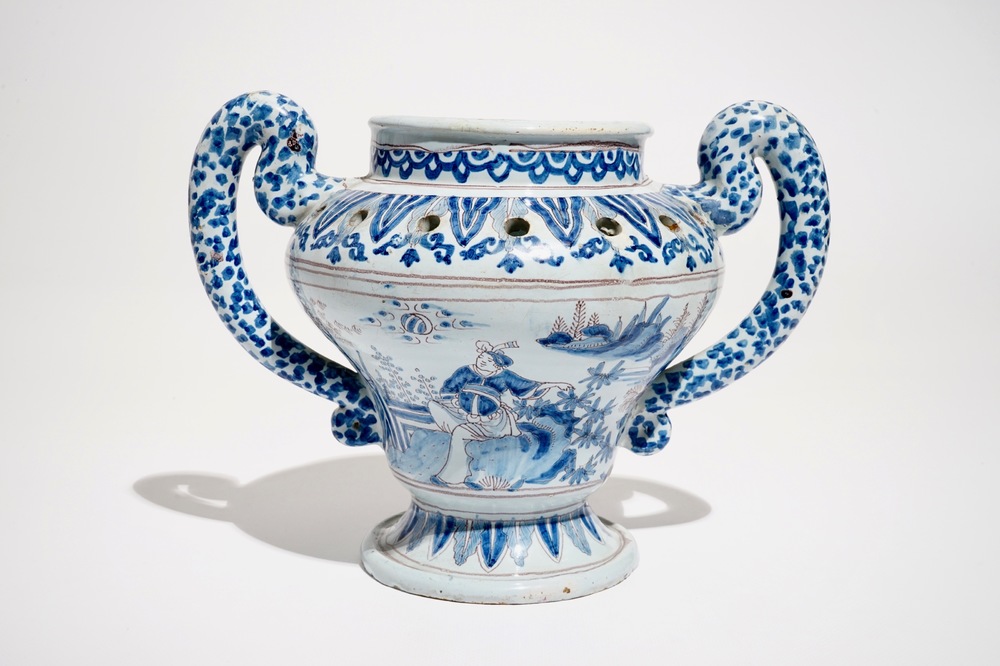 A Nevers faience chinoiserie flower holder in blue, white and manganese, France, 17th C.