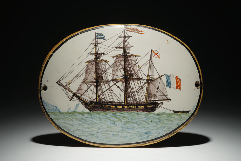 A polychrome French faience plaque with a three-master, 19th C.