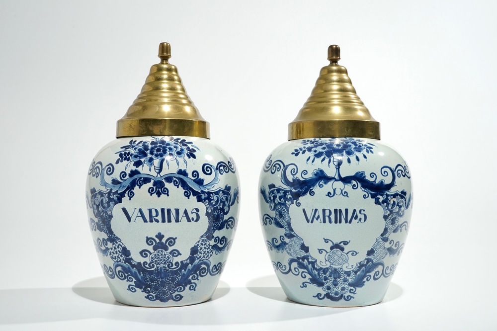 A pair of Dutch Delft blue and white tobacco jars, 19th C.