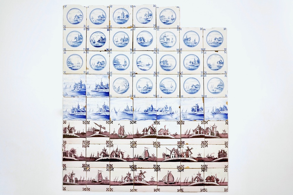 54 Dutch Delft manganese and blue and white tiles with landscapes, 19th C.