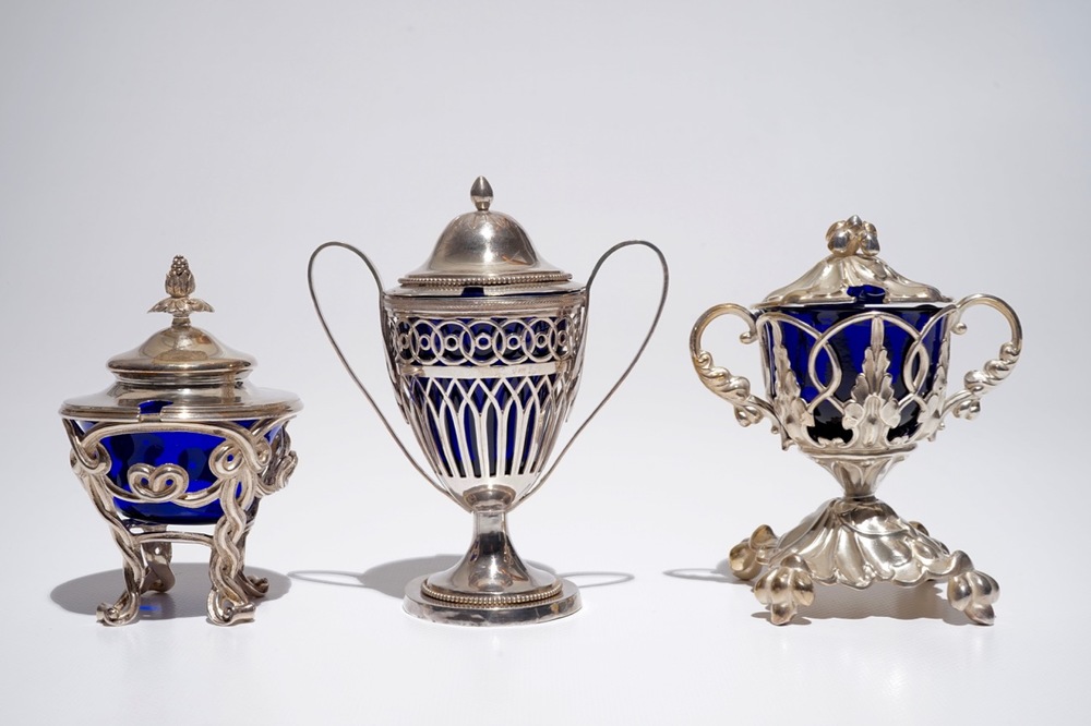 Three silver mustard jars with blue cristal interiors, 19th C.