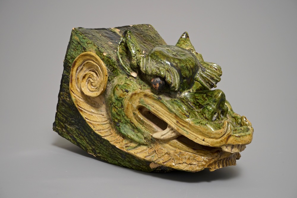 A Chinese roof tile shaped as a dragon's head, 19th C.