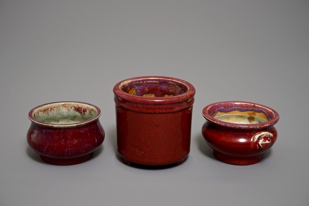 Two Chinese oxblood-glazed incense burners and a brush pot, 19/20th C.