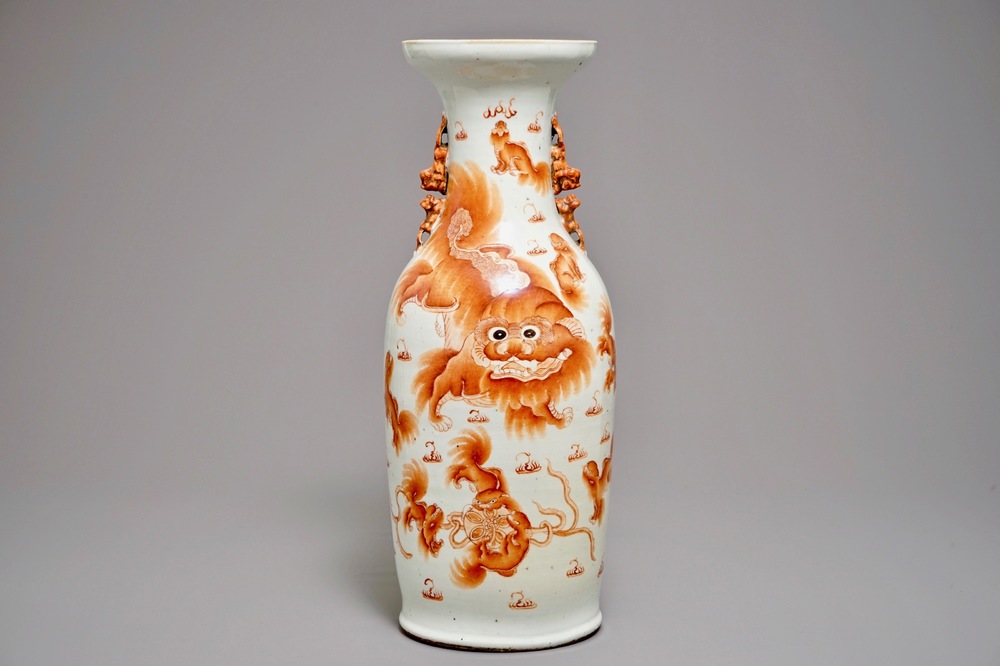 A Chinese iron red vase with Buddhist lions, 19th C.