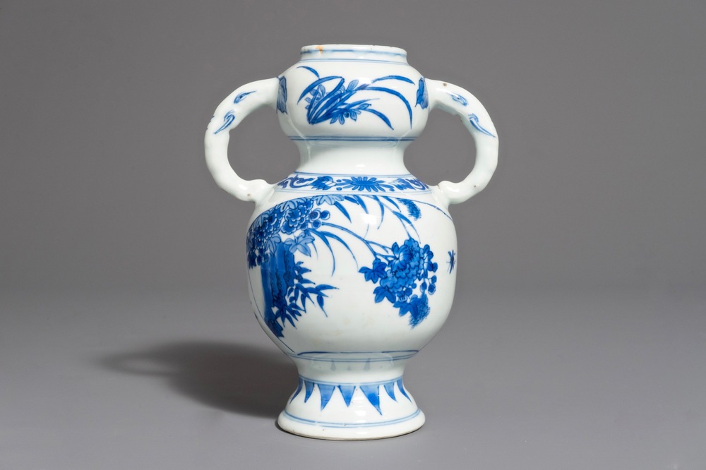 A Chinese blue and white elephant handle vase, Transitional period