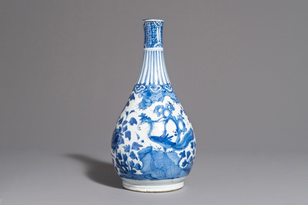 A fine Chinese blue and white bottle vase with a phoenix, hare mark, Wanli