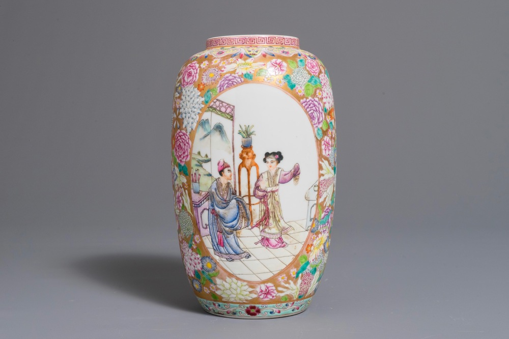 A Chinese famille rose millefleurs vase with figurative medallions, 20th C.