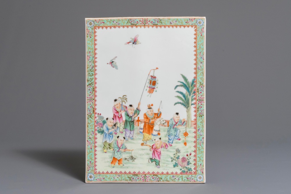 A Chinese famille rose plaque with playing boys, 1st half 20th C.