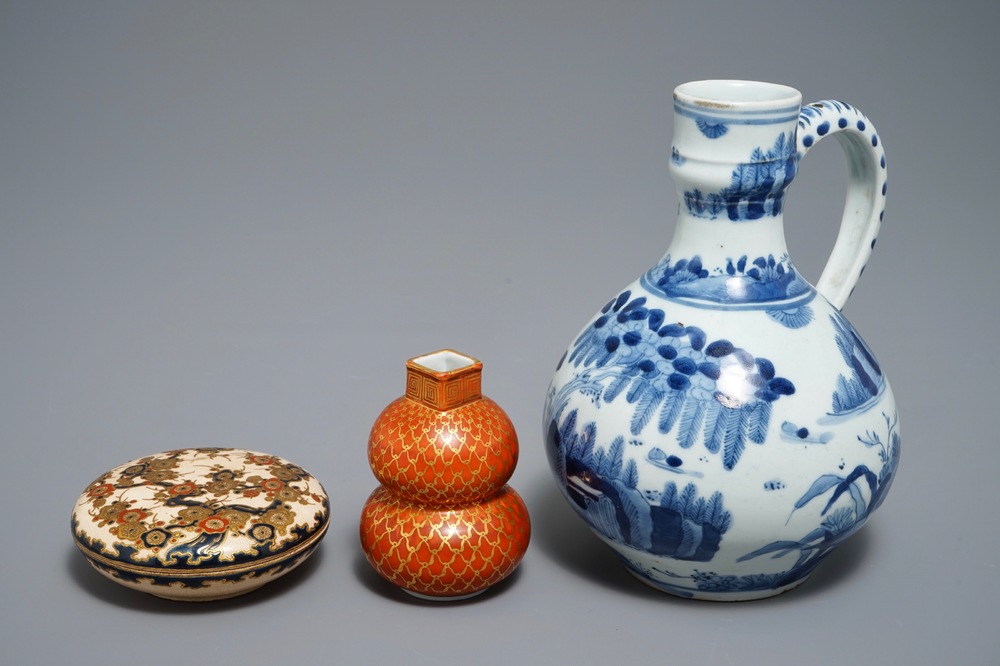 A Japanese blue and white Arita jug, Edo, 17th C., a small Kutani vase and a Satsuma box, Meiji, 19th C.