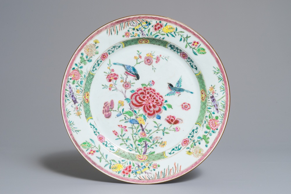 A Chinese famille rose dish with birds among peonies, Yongzheng/Qianlong