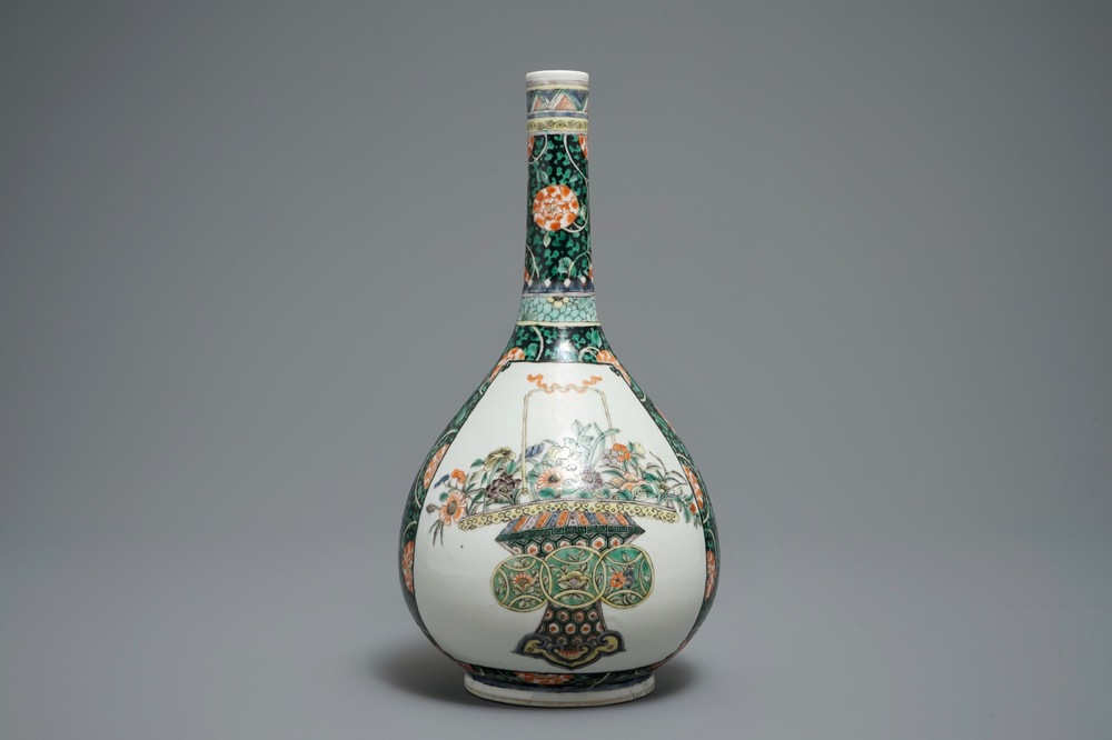 A Chinese famille verte bottle vase with fine flower baskets, 19th C.