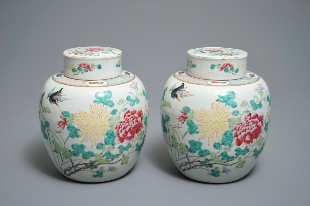 A pair of Chinese famille rose jars and covers with insects and flowers, Qianlong mark, 19/20th C.