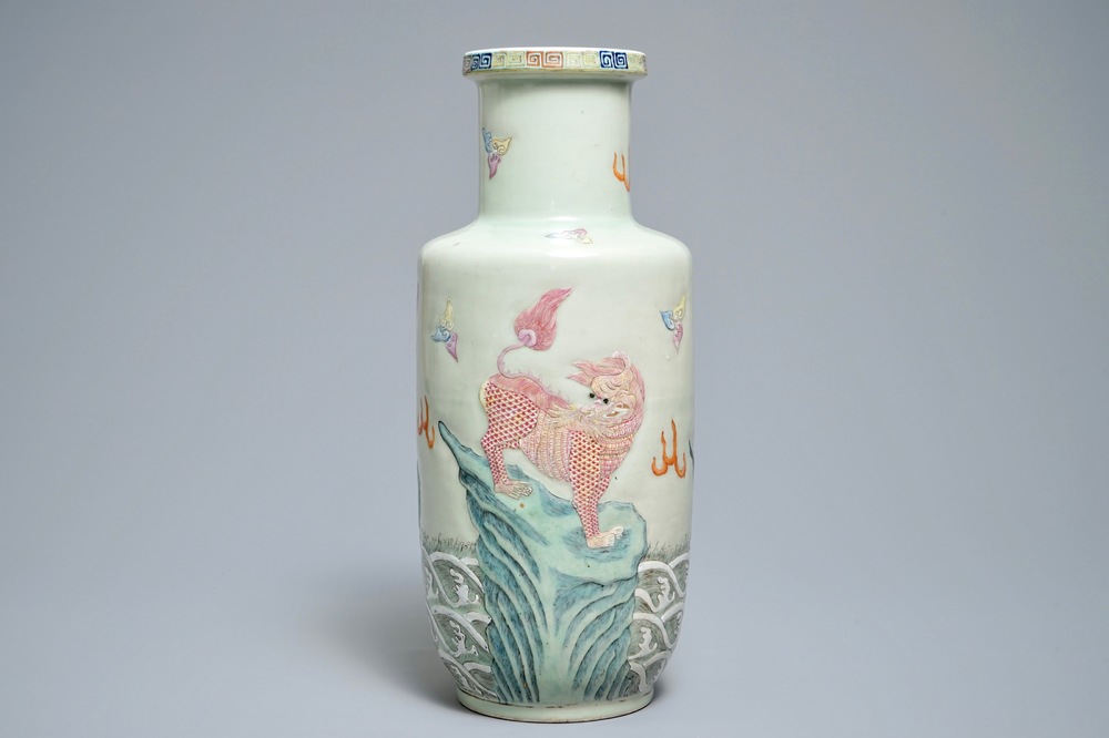 A Chinese famille rose rouleau vase with applied design of mythical beasts, Qianlong mark, 19th C.