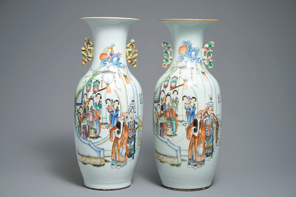 A pair of Chinese famille rose vases with figures on a terrace, 19/20th C.