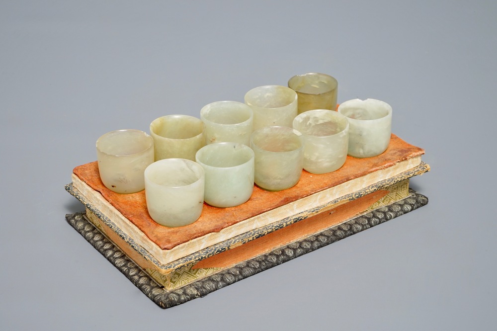 A set of ten Chinese celadon jade cups, 19/20th C.