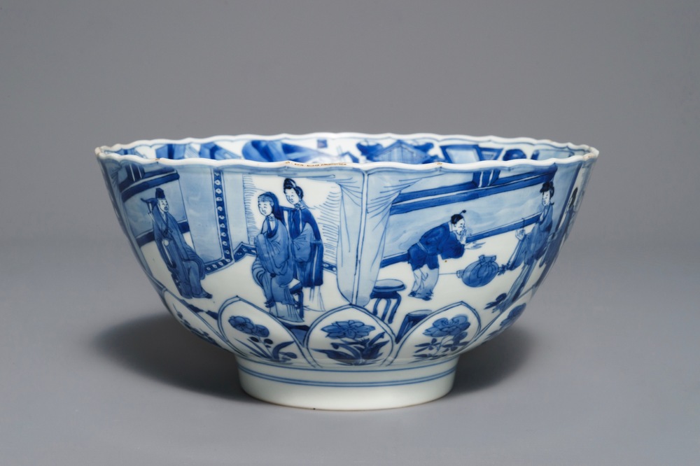 A Chinese blue and white moulded bowl with figurative panels, Xuande mark, Kangxi