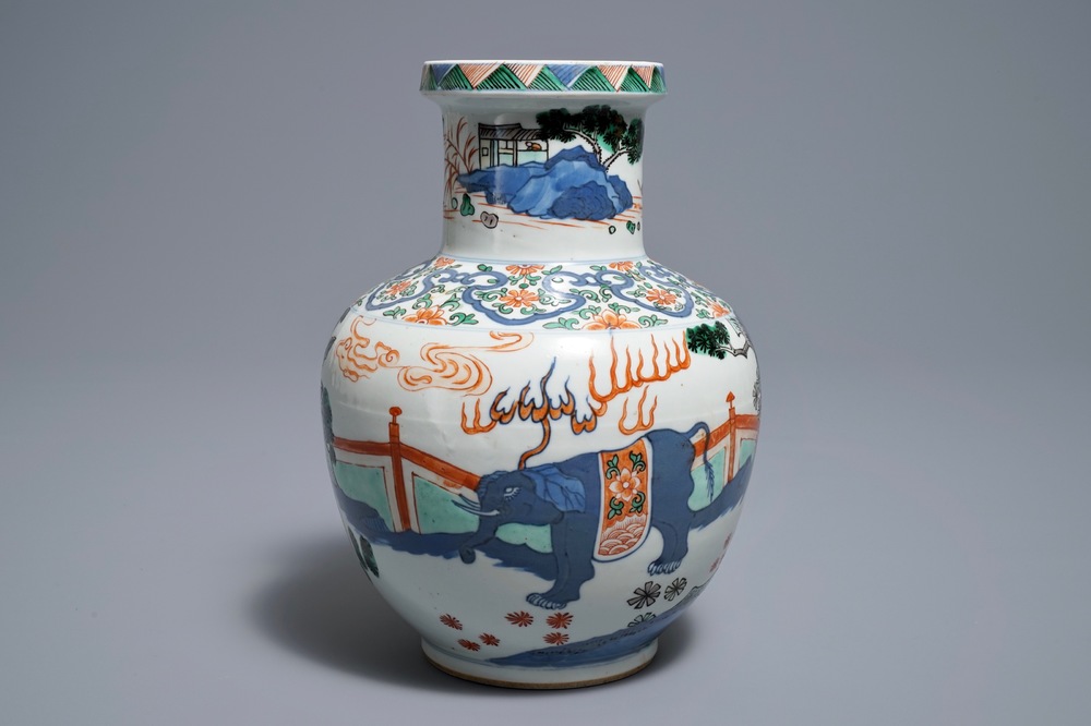 A Chinese wucai 'mythical beasts' vase, 19/20th C.