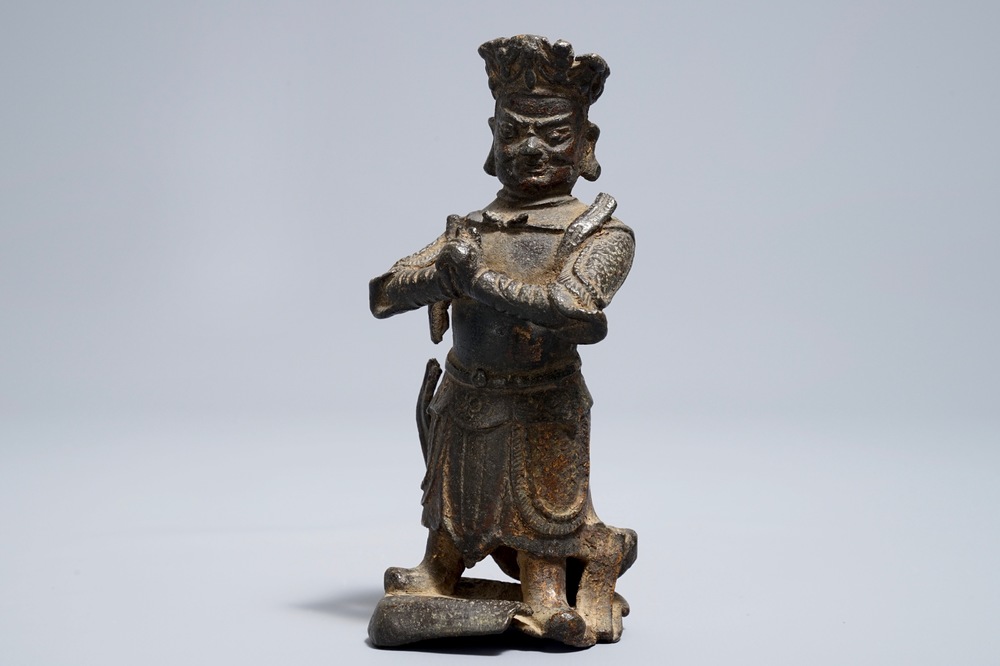 A Chinese bronze model of a guardian, Ming