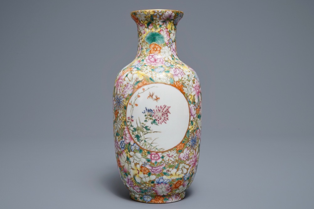 A Chinese famille rose millefleurs vase, Qianlong mark, 20th C.