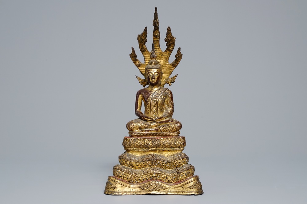 An inlaid gilt-lacquered bronze figure of Buddha, Burma, 19th C.