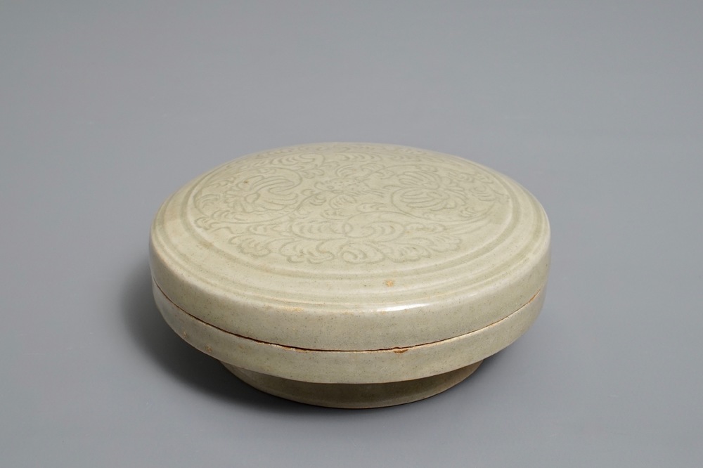 A Chinese grey-glazed round box and cover with underglaze design, Northern Song or later