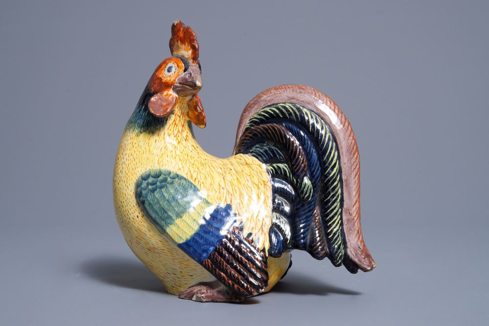 A polychrome Dutch Delft model of a rooster, 19th C.