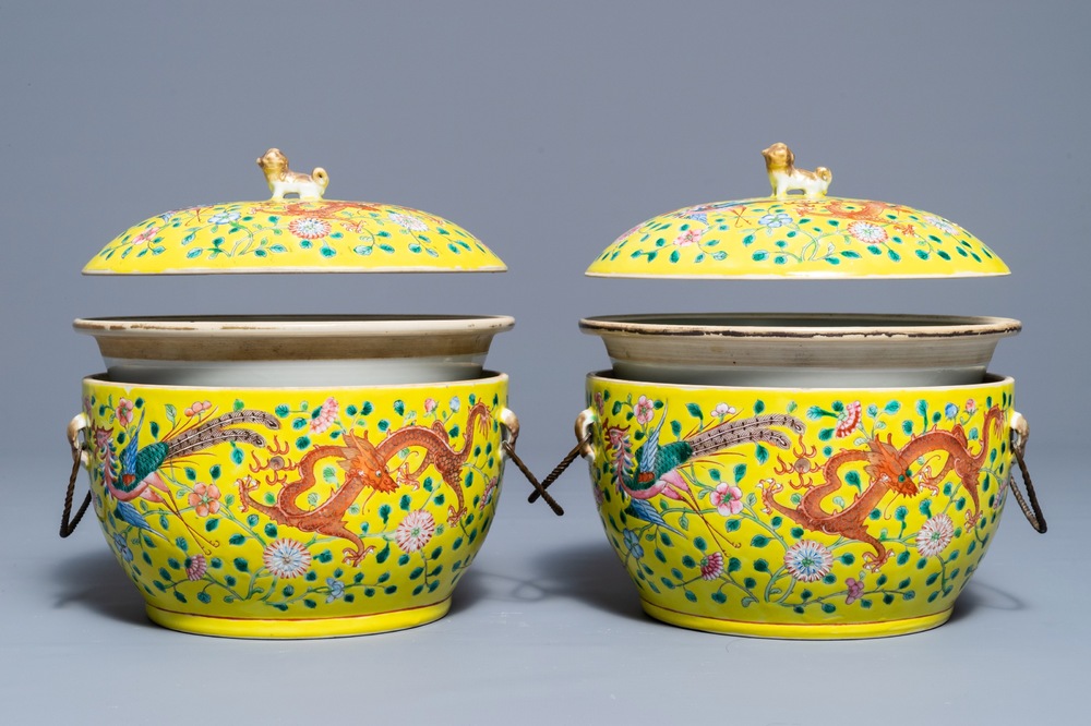 A pair of Chinese famille jaune tureens and covers with dragons and phoenixes, 19th C.