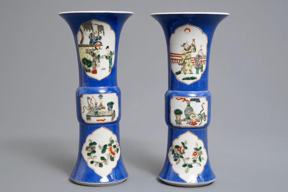 A pair of Chinese famille verte on powder blue ground gu vases, Kangxi mark, 19th C.