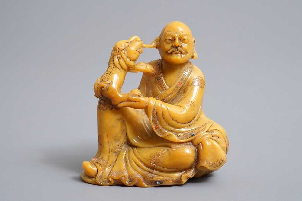 A Chinese inlaid Shoushan soapstone figure of a Luohan, 19/20th C.