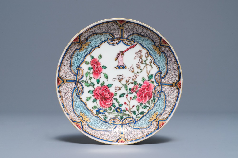 A fine Chinese famille rose saucer plate with armorial and floral design, Yongzheng