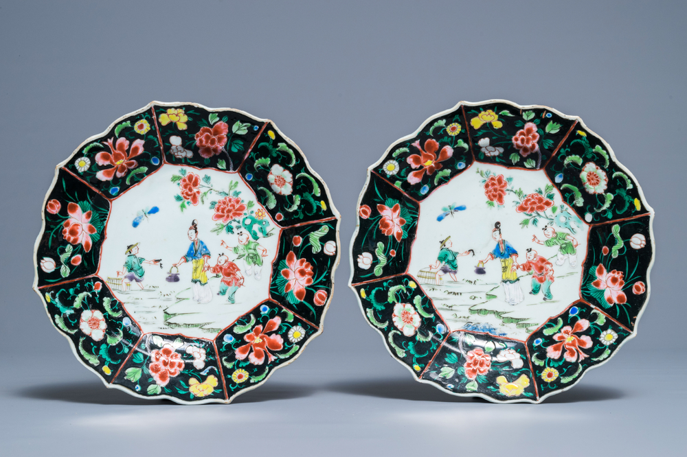 A pair of Chinese famille noire plates, Yongzheng
