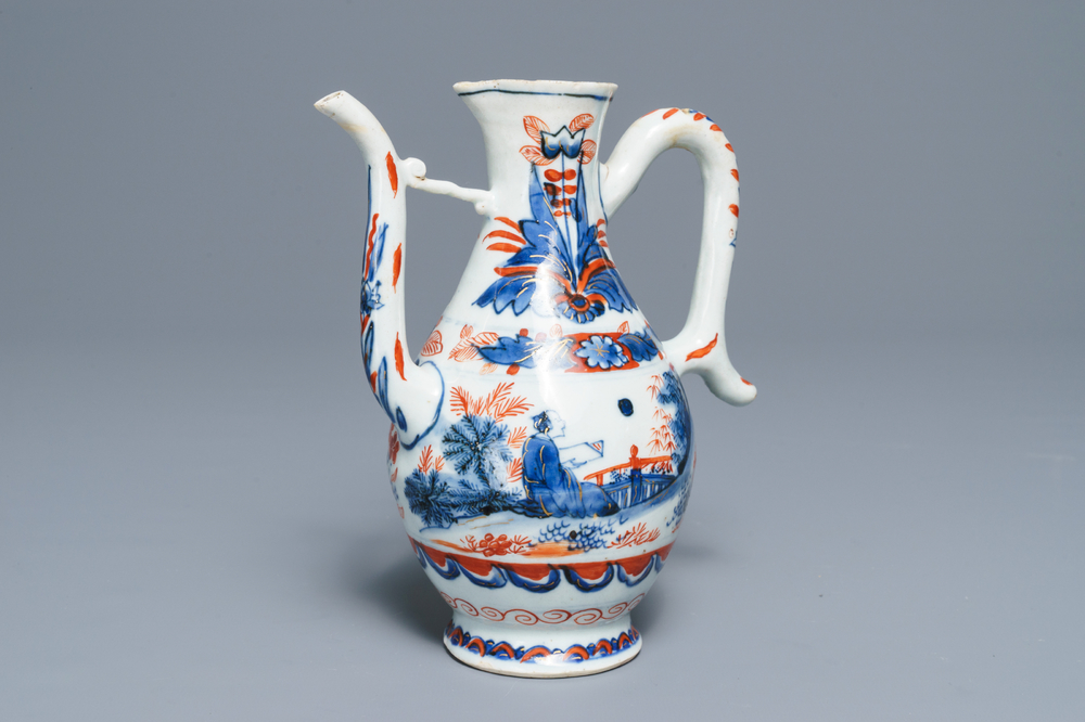 A clobbered Chinese blue and white ewer, Transitional period