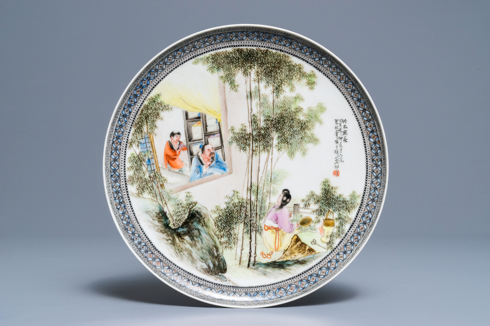 A Chinese fencai plate with figures in a garden, Republic, 20th C.