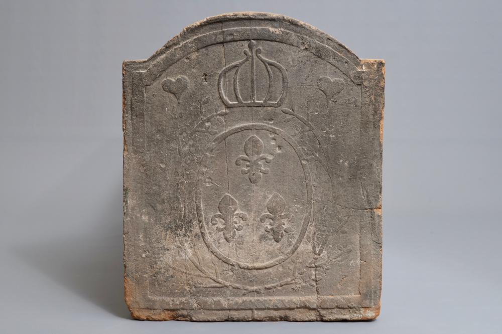 A large French pottery fireplace tile with fleur-de-lis, 17th C.