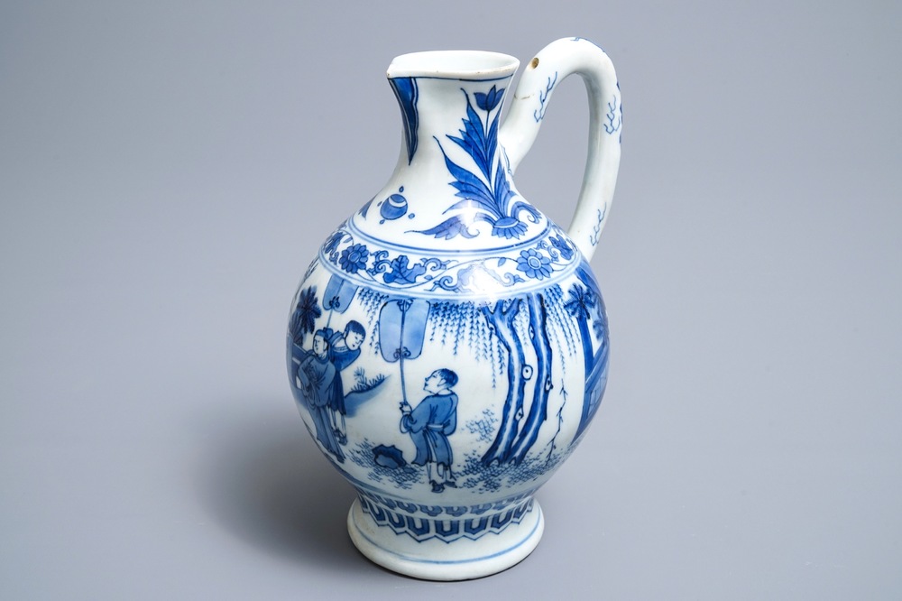 A Chinese blue and white jug with figures in a landscape, Transitional period