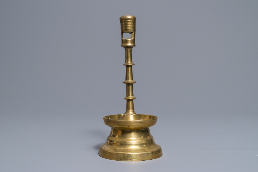 A gothic bronze candlestick, Low Countries, 15/16th C.