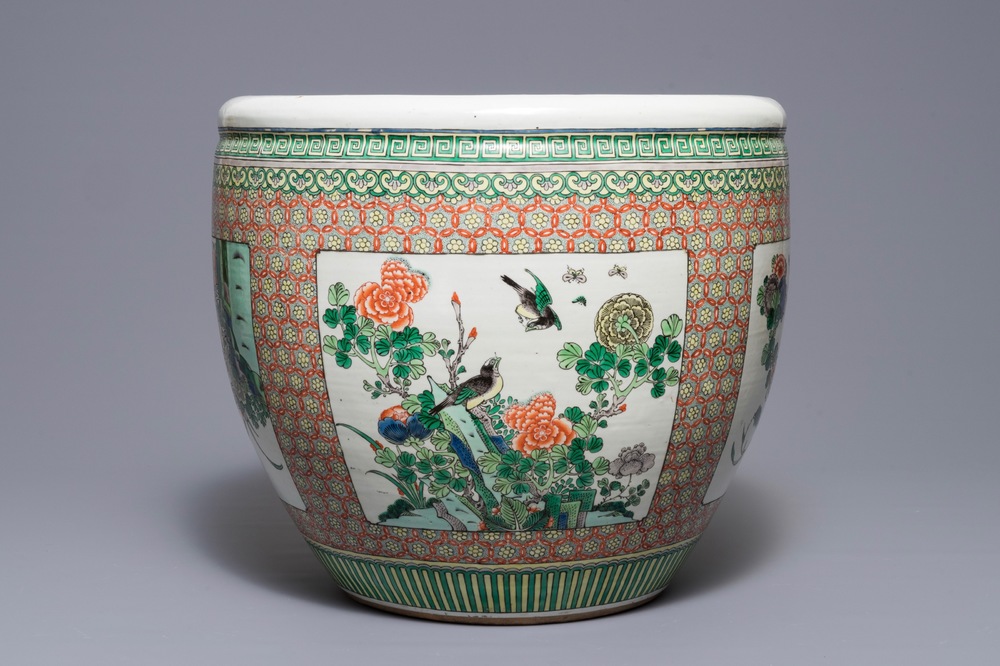 A Chinese famille verte fish bowl with birds among flowers, 19th C.